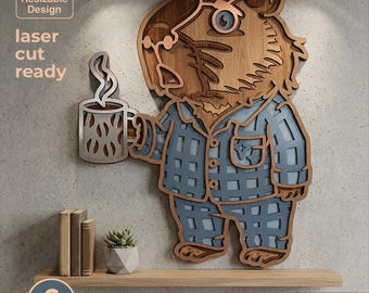 May include: A multi-layered laser-cut wood wall art piece depicting a capybara wearing blue plaid pyjamas and glasses while holding a steaming mug. The design features six distinct layers, with text reading Resizable Design, laser cut ready, and 6 LAYERS SVG - EPS - DWG - DXF - AI.