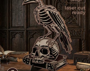 May include: A multi-layered laser cut design featuring a skeletal raven perched atop a human skull resting on a book. The artwork consists of 5 layers and includes the text Resizable Design, laser cut ready, and 5 LAYERS SVG - EPS - DWG - DXF - AI.