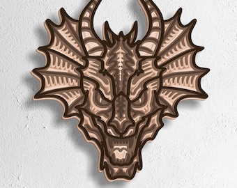 May include: A multi-layered wooden dragon head sculpture in shades of brown. The dragon features horns, detailed scales, and a fierce expression. The image includes the text "SVG - EPS - DWG - DXF - AI".