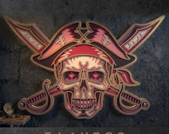 May include: A multi-layered 3D wall art piece featuring a skull wearing a pirate hat with crossed swords behind it. The design uses shades of red, cream, and dark brown. Text at the top reads SVG - EPS - DWG - DXF - AI and 7 LAYERS at the bottom.