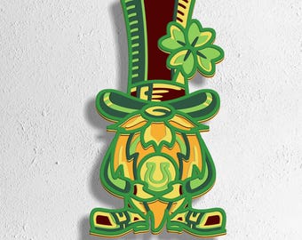 May include: A green leprechaun wearing a red top hat and a four-leaf clover. He is holding a gold horseshoe in his hands.