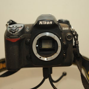 Nikon D200 DSLR Camera body only with woven Nikon D200 branded strap image 1