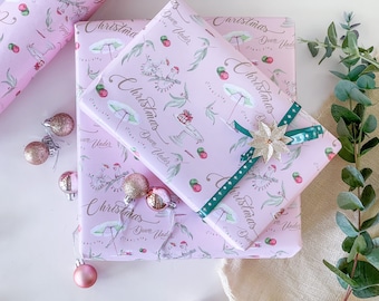 Christmas Down Under wrapping paper with Wombat, Pavlova, gum leaves and beach umbrella on a pink background