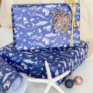 Great White Christmas australian Christmas wrapping paper with sharks, blue ringed octopus, crab and coral Christmas Tree on blue background