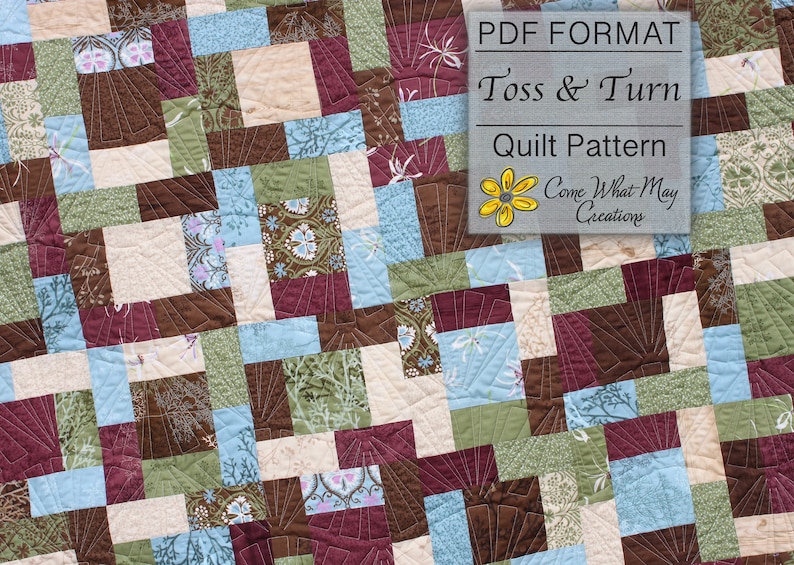 May include: A quilt pattern in PDF format called "Toss & Turn" by Come What May Creations. The quilt features a patchwork design with squares of brown, blue, green, and cream fabric.