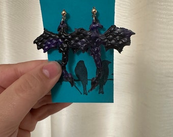 Purple and black swirl dragon clay earrings