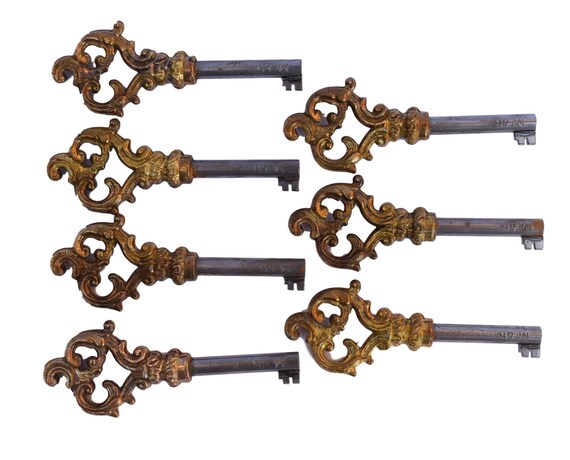 One Antique French Brass Beaded Barrel Key
