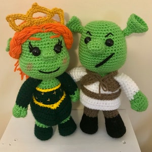 Green ogre and his princess, Shrek and Fiona like dolls