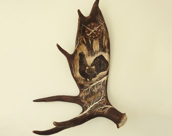 Enorme Moose Shed Carving toont auerhoen