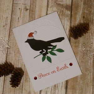 Carte de Noël d’oiseau fait main, Paix sur Terre, Carte de Noël pour animaux de compagnie, Carte d’oiseau de Noël, Carte de Noël Bird sur branche, Carte d’oiseau du Père Noël