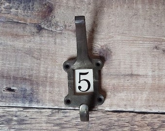 Cast Iron Coat Hooks With Ceramic Label Number 5