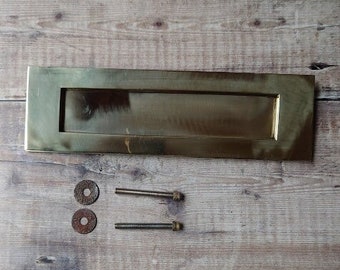 Polished brass reclaimed door mail slot