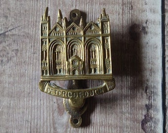 Petit heurtoir de porte en laiton de la cathédrale de Peterborough