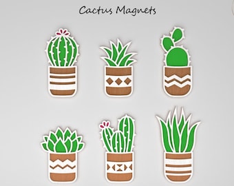 May include: Six different cactus designs in pots, ready to be cut out and used as magnets. The designs include a barrel cactus, a prickly pear cactus, and a variety of succulents. The text "Cactus Magnets" is at the top of the image. The text "Digital Cut File Instant Download" is at the top right of the image. The text "SvgCutArt LASER CUT FILES SVG/EPS/DXF" is at the bottom of the image.