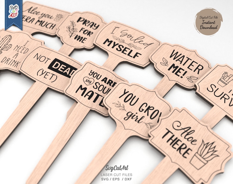 May include: Set of ten wooden garden stakes with various humorous and cute sayings. The stakes feature phrases like "Aloe You Vera Much", "Pray For Me", "I Gorled Myself", "Water Me!" and "You Grow Girl".