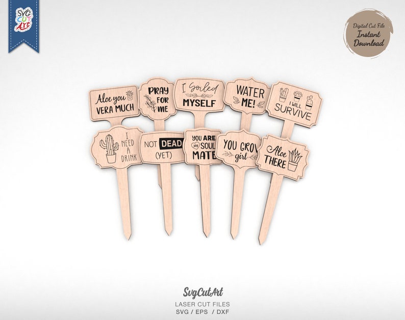 May include: Set of ten wooden plant markers with humorous sayings about plants and cacti. The markers are laser cut and feature a variety of designs, including cacti, succulents, and aloe vera plants. The sayings include "Aloe you vera much", "Pray for me", "I gorled myself", "Water me!", "I will survive", "I need a drink", "Not dead (yet)", "You are my soul mate", "You grow girl", and "Aloe there".
