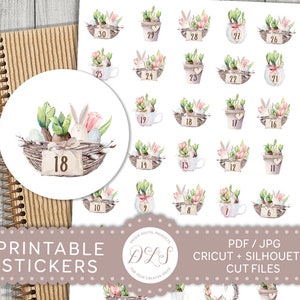 Op de afbeelding: Printbare Pasen-stickers met een aquarel-illustratie van een konijn in een nest met lentebloemen en het nummer 18. De stickers zijn ontworpen voor gebruik met Cricut- en Silhouette-snijmachines.