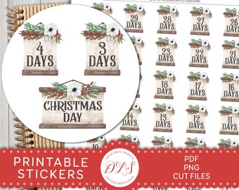 May include: Printable Christmas countdown stickers with a rustic design. The stickers feature a white background with a brown wooden frame and a white flower garland. The numbers 1-29 are displayed on the stickers, along with the words "Days" and "Christmas Day".