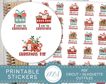 May include: Printable Christmas countdown stickers featuring a red and green gift box design with the text "Days 'til Christmas". The stickers are arranged in a circle with the text "Christmas Day" in the center.