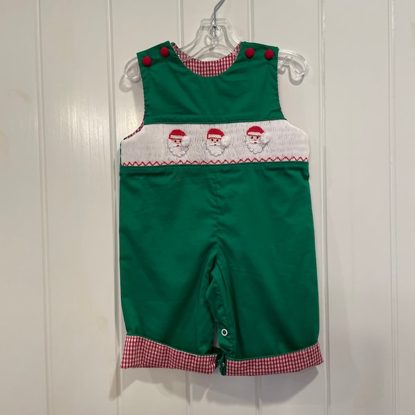 Hand smocked Santa JonJon. Green Santa Jon Jon with red checked lined pants that you can turn up.