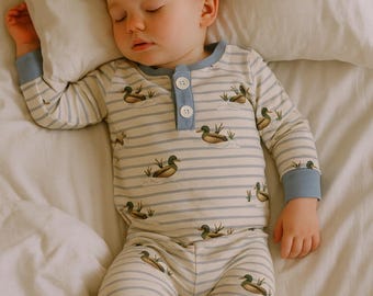 Duck, Duck Goose pink stripe and ruffle pajamas. The softest cotton and spandex pajamas that your little one will want to wear all day .