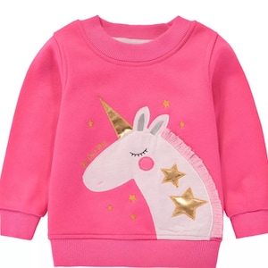 Super soft hot pink unicorn sweatshirt! Appliqué unicorn sweatshirt is machine washable. Your little one will love the sweatshirt so much!