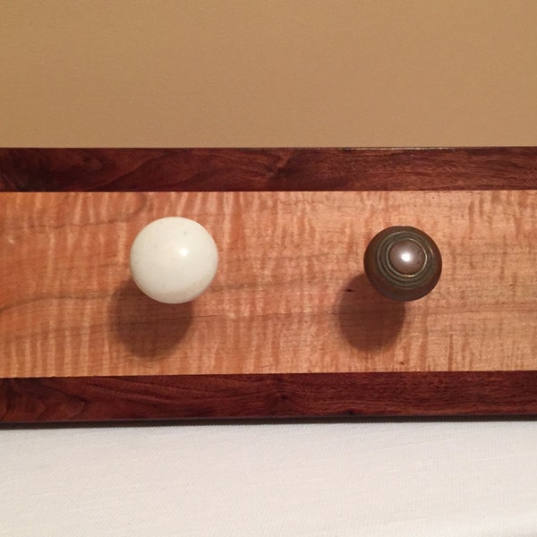 Coat, hat or scarf hanger made with from luxurious woods and antique door knobs