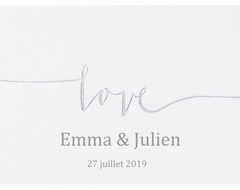 The customizable white and silver love guest book