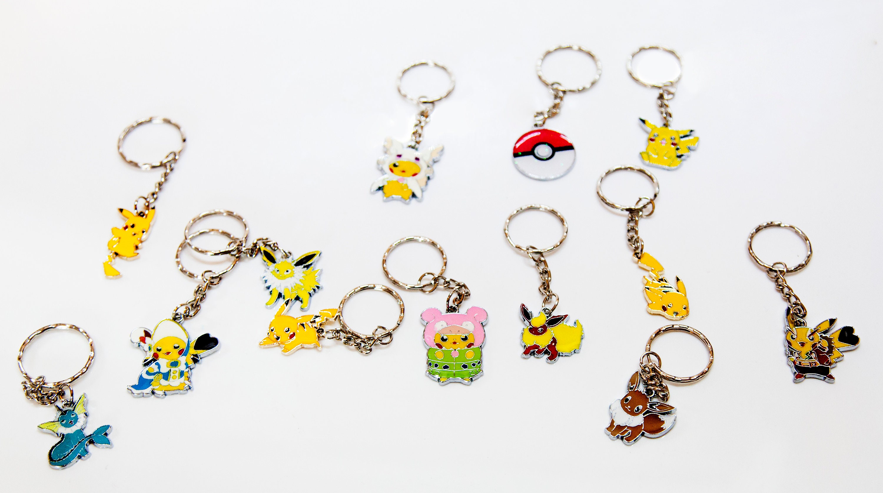 Pokemon themed keyrings, perfect for party favours, stocking fillers, bag  charms,birthdays, fun keyrings