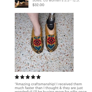 May include: Knit slipper socks with suede soles in a yellow, red, and blue pattern. The socks are shown on a person's feet. The caption reads "Amazing craftsmanship! I received them much faster than I thought & they are just wonderful! I'll be buying more for gifts once I find out everyone's sizes :-)"