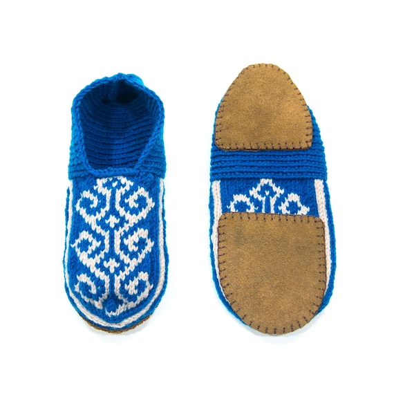 white and blue slippers