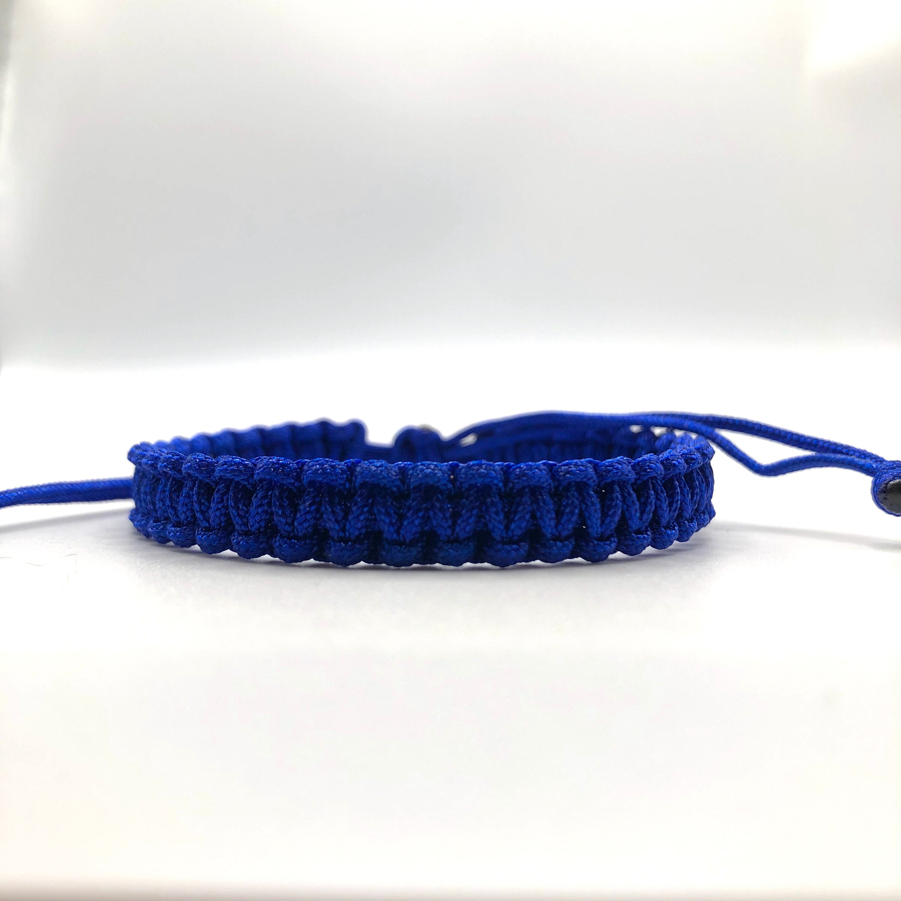 Black & Sunset w/ Blue Color Splotches Bead Clear Elastic String Bracelet