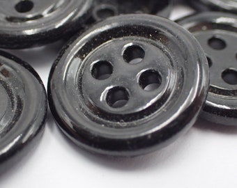 Dieci bottoni, Art Nouveau in vetro nero