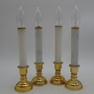 four vintage candle