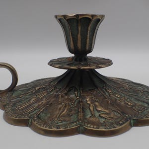 Antique bronze candlestick by Max the Glassmaker