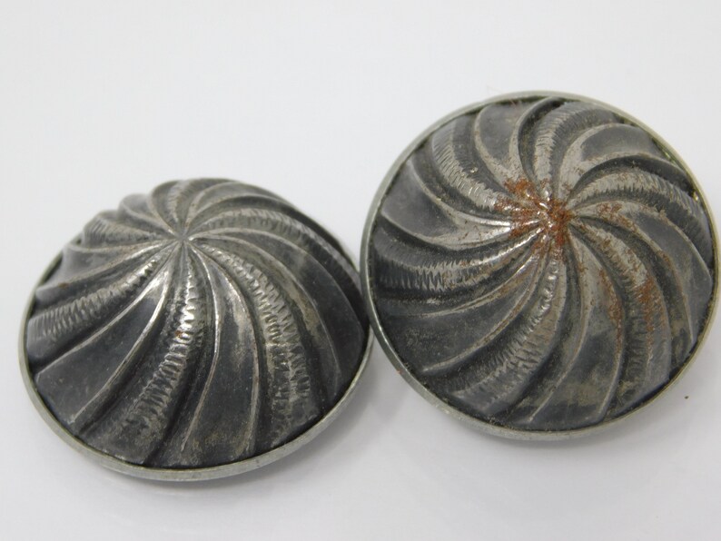 pair of silver ball buttons