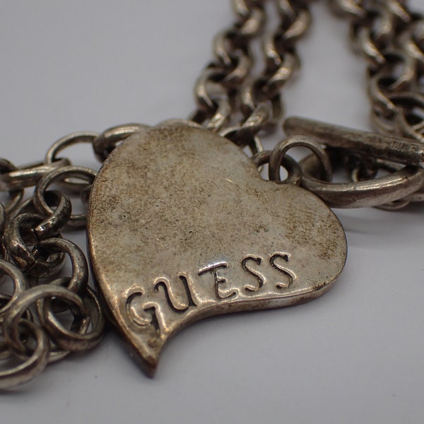silver metal guess necklace