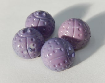 Quatre boutons vintage ,violet ,diamètre 1,3 cm