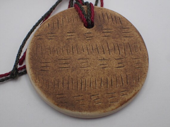 ceramic medallion, wild earth by faustine Cayol View 2