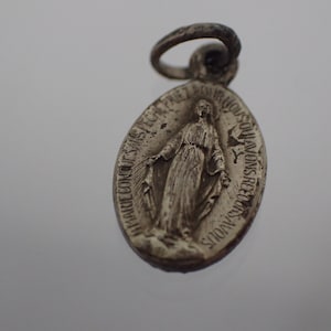old religious medal
