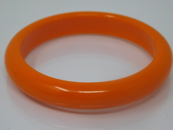 bangle, vintage bakelite orange bracelet