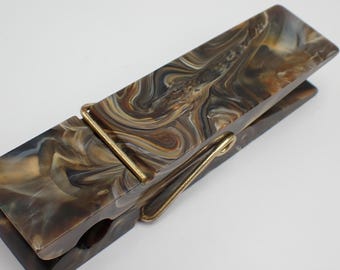 pince à billet ancienne en bakélite