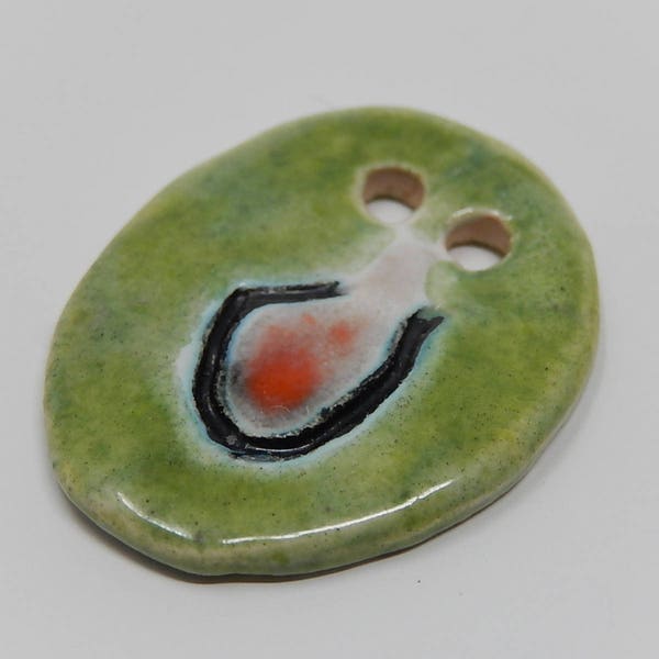 Pendentif ,médaillon,cabochon en céramique