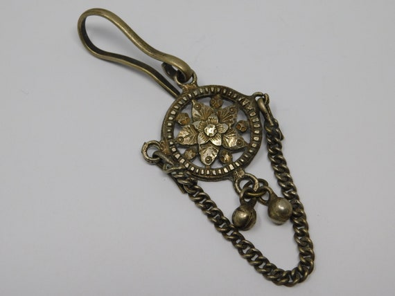 oriental châtelaine with bells