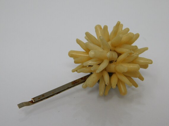 old barrette, bakelite spade ball