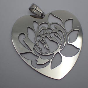 ciondolo a forma di cuore in argento vintage