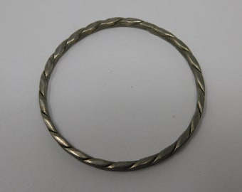 Bracelet, braided metal ring