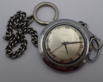 reloj antiguo con su chatelaine