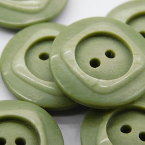 seven green vintage buttons