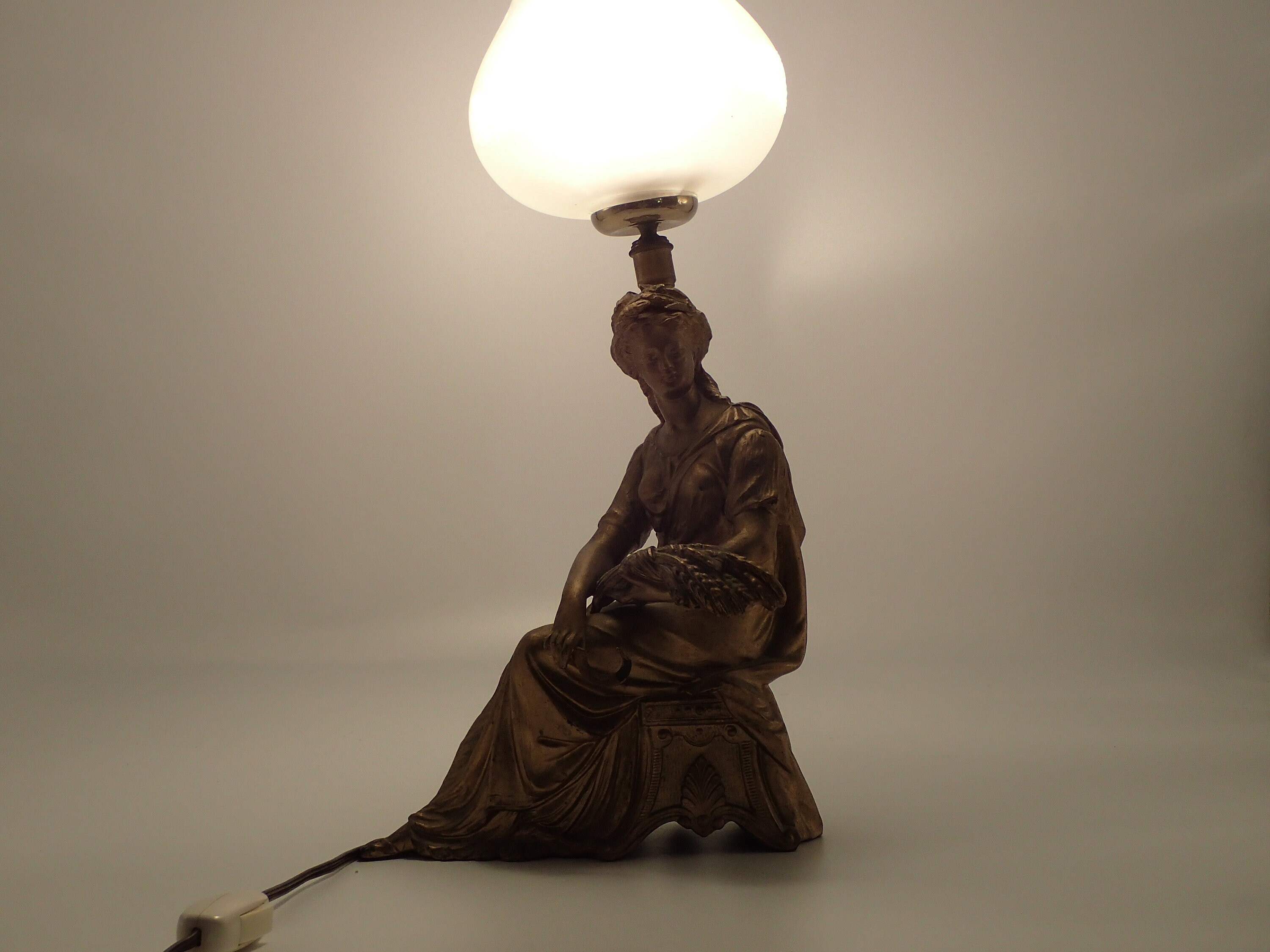 Vintage statue lamp with illuminated globe Etsy